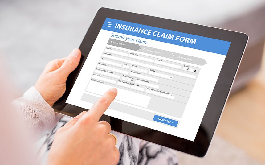 Woman Submitting Insurance Claim Online